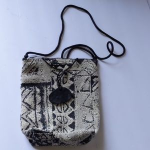 Small crossbody art-to-wear bag-sz 8x9x2 1/2 inches.